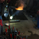 Illustration for article titled Casting Molten Metal On Wood With a Hungarian Design Master